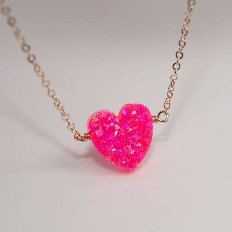 Red heart opal necklace on thin gold chain